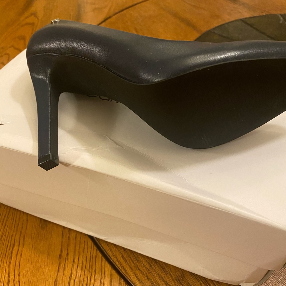 Navy Calvin Klein heels.